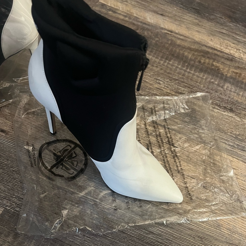 Michael Kors ankle boots. Size 9 1/2 women’s. Black Fabric and White Leather